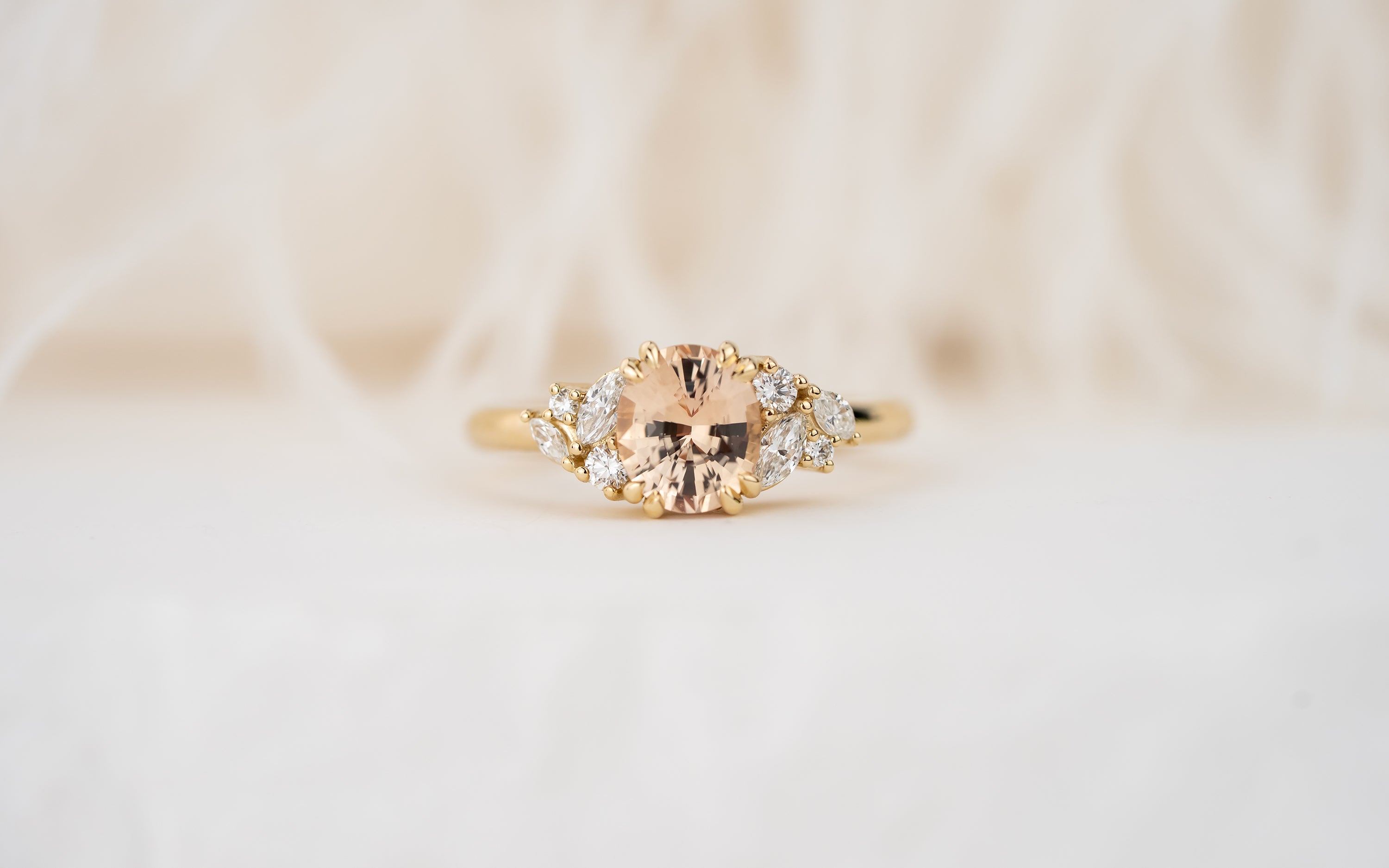 The Laurel Ring | 1.55 CT Oval Peachy Apricot Sapphire