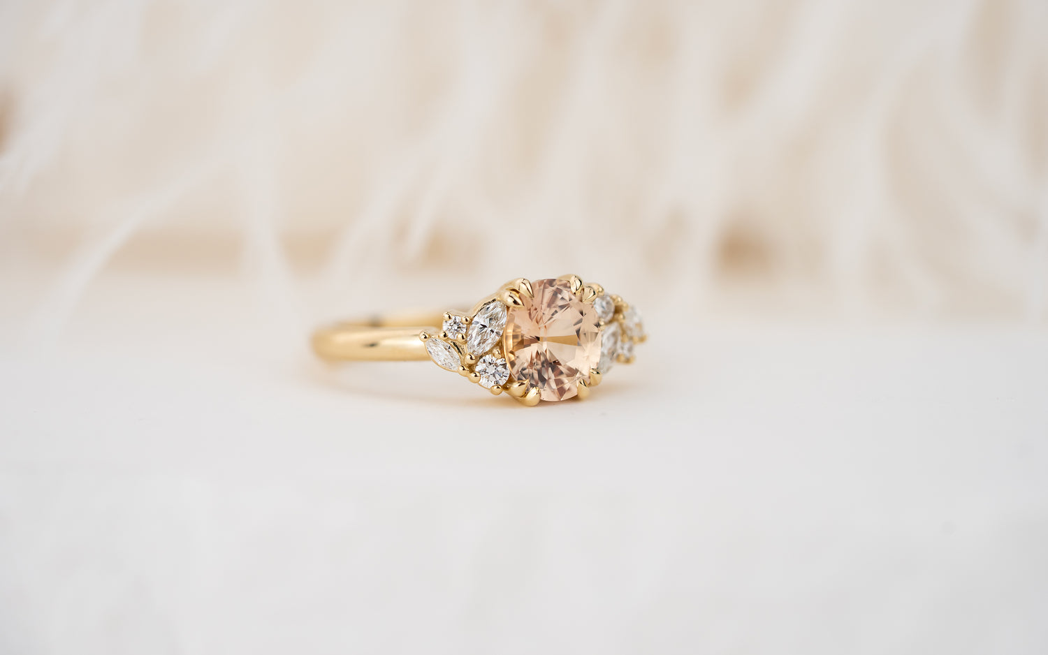 The Laurel Ring | 1.55 CT Oval Peachy Apricot Sapphire