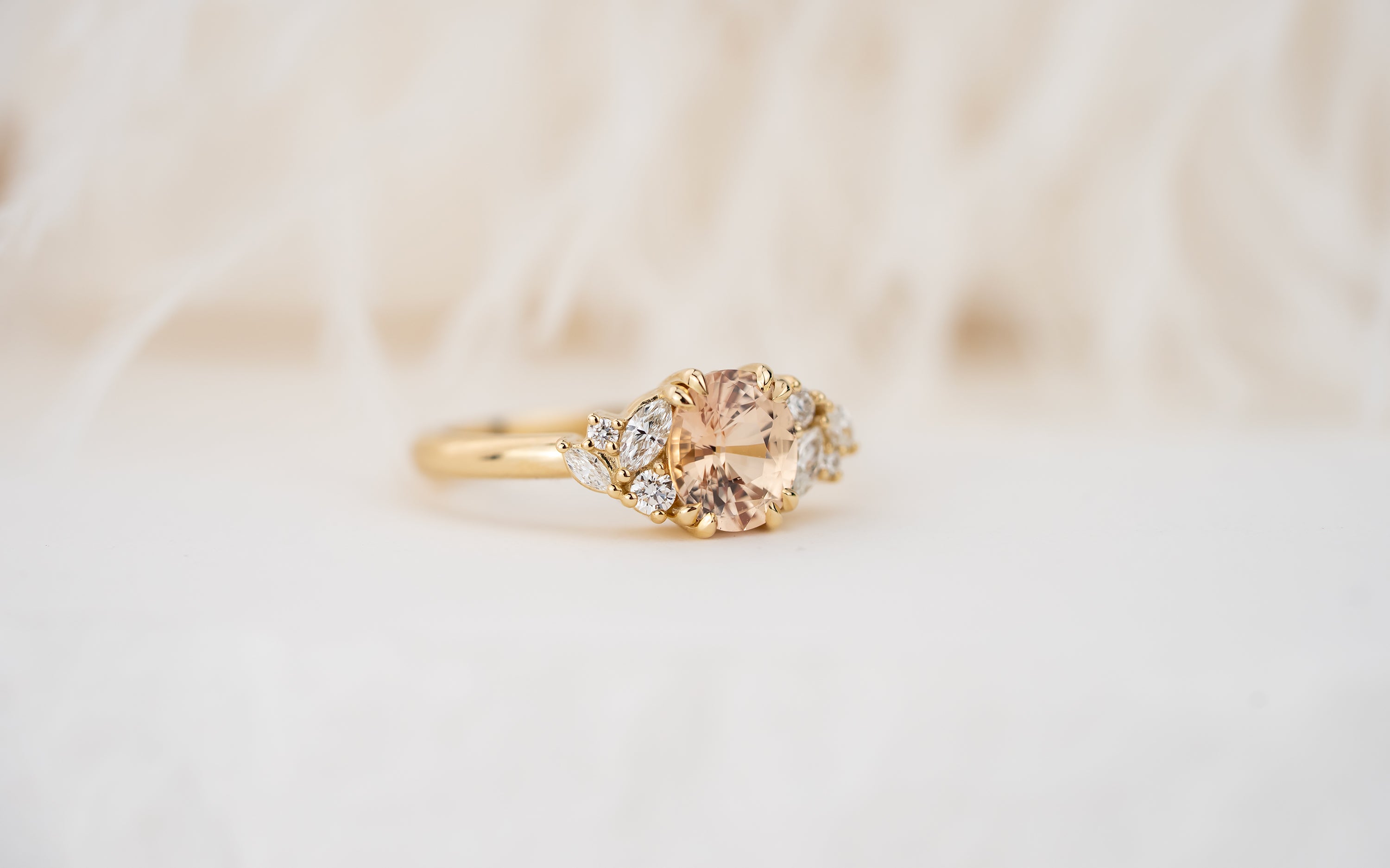 The Laurel Ring | 1.55 CT Oval Peachy Apricot Sapphire