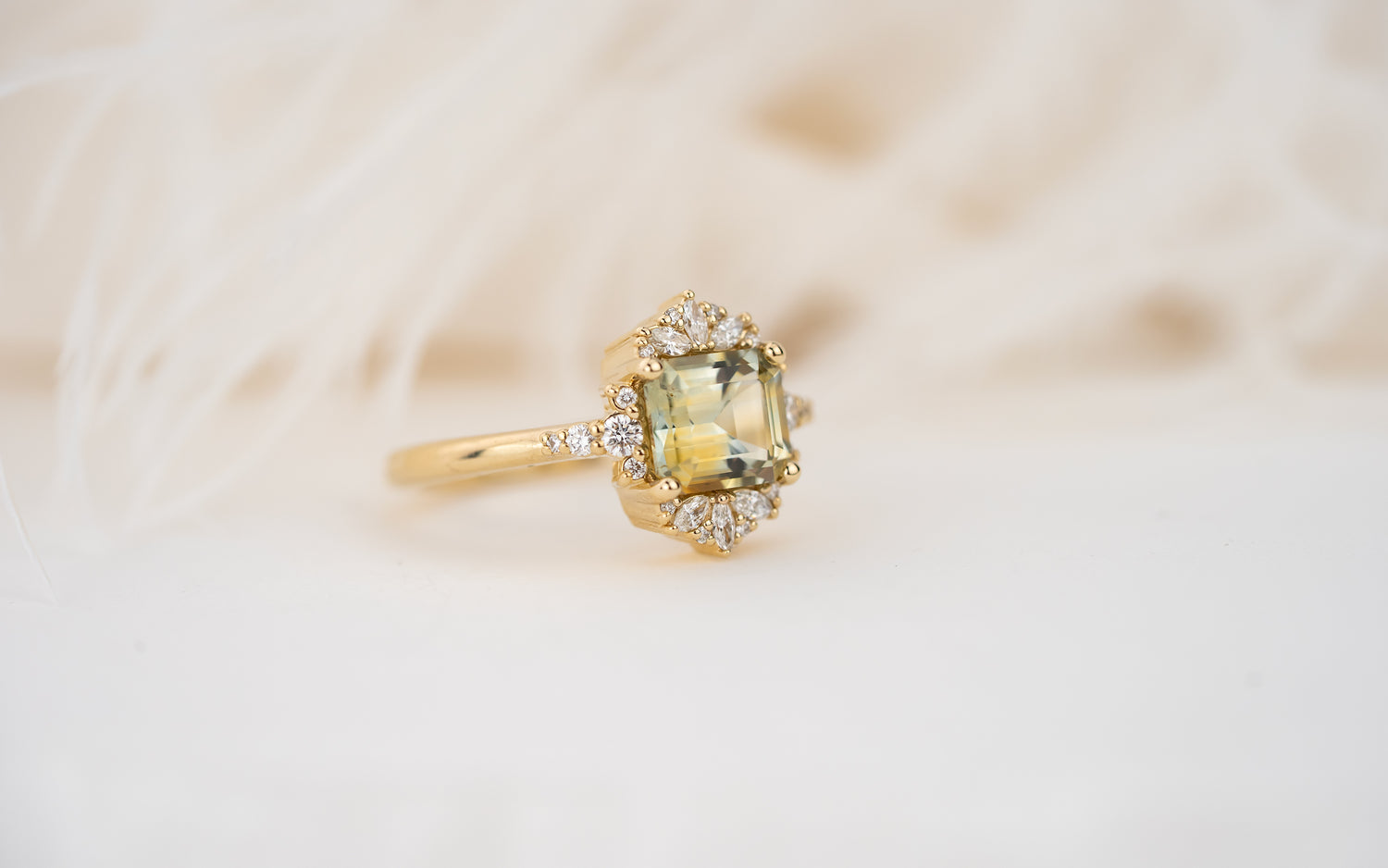 The Comtesse Ring | 2.04 CT Emerald Cut Green Bicolor Montana Sapphire