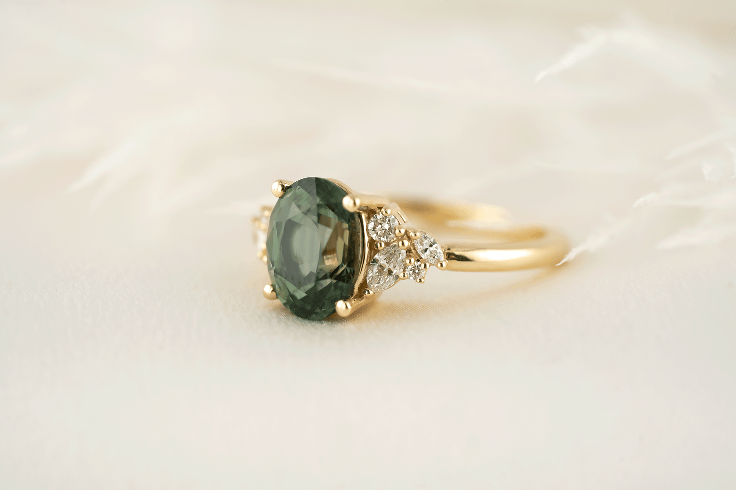 The Laurel Ring | 3.06 CT Oval Teal Green Sapphire