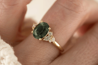 The Laurel Ring | 3.06 CT Oval Teal Green Sapphire