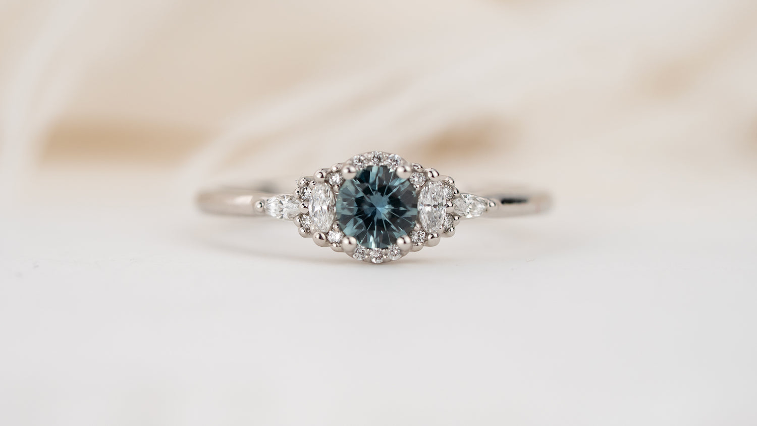The Halo Mini Maeve Ring | Round Montana Sapphire