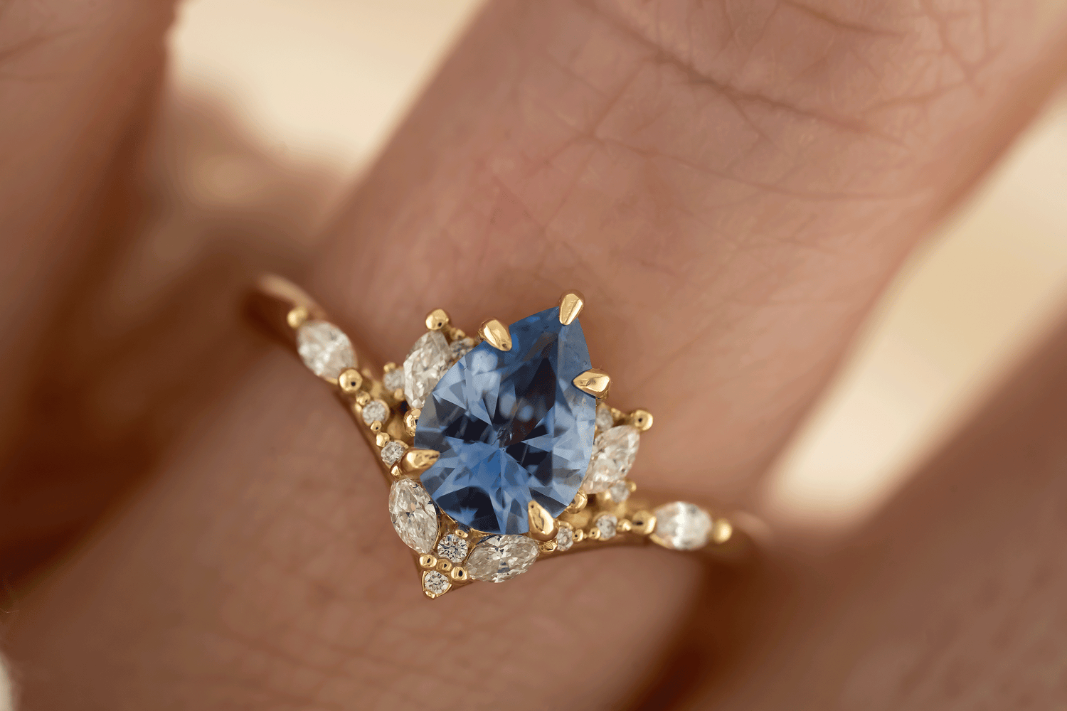 The Aurora Ring | 1.29 CT Pear Blue Sapphire