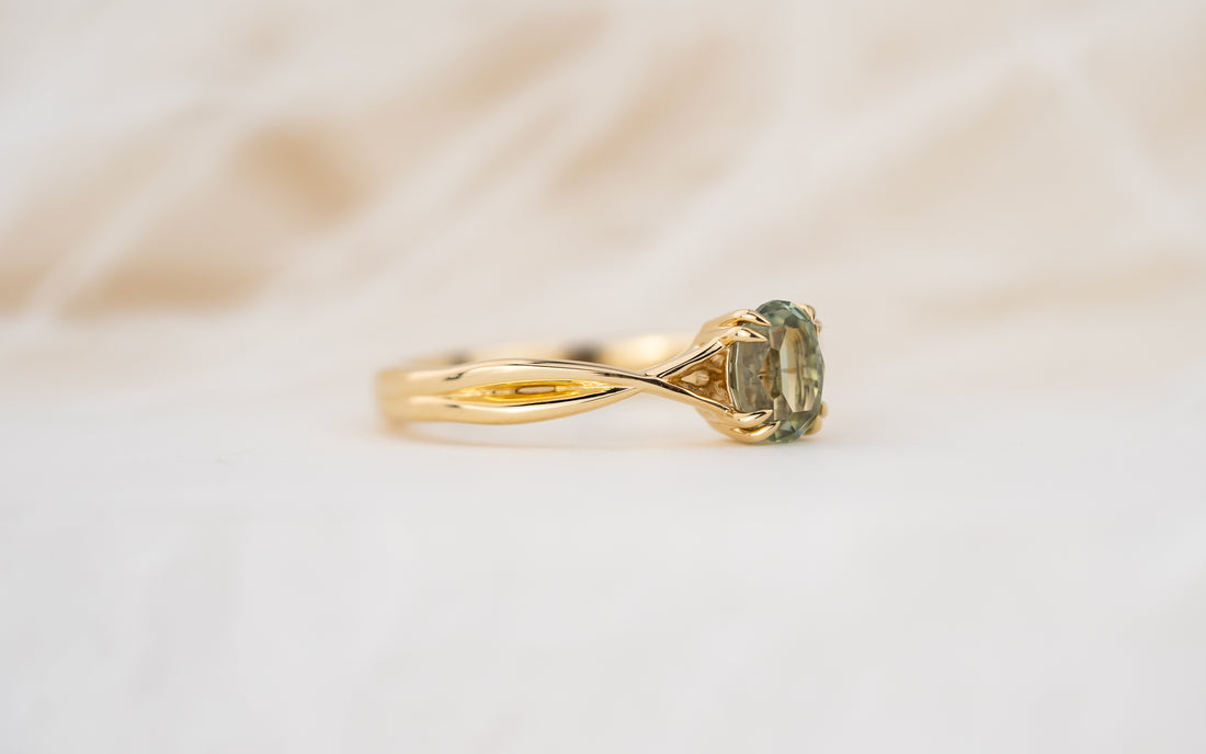 The Fates Ring | 1.1 CT Oval Regal Radiant™ Green Montana Sapphire
