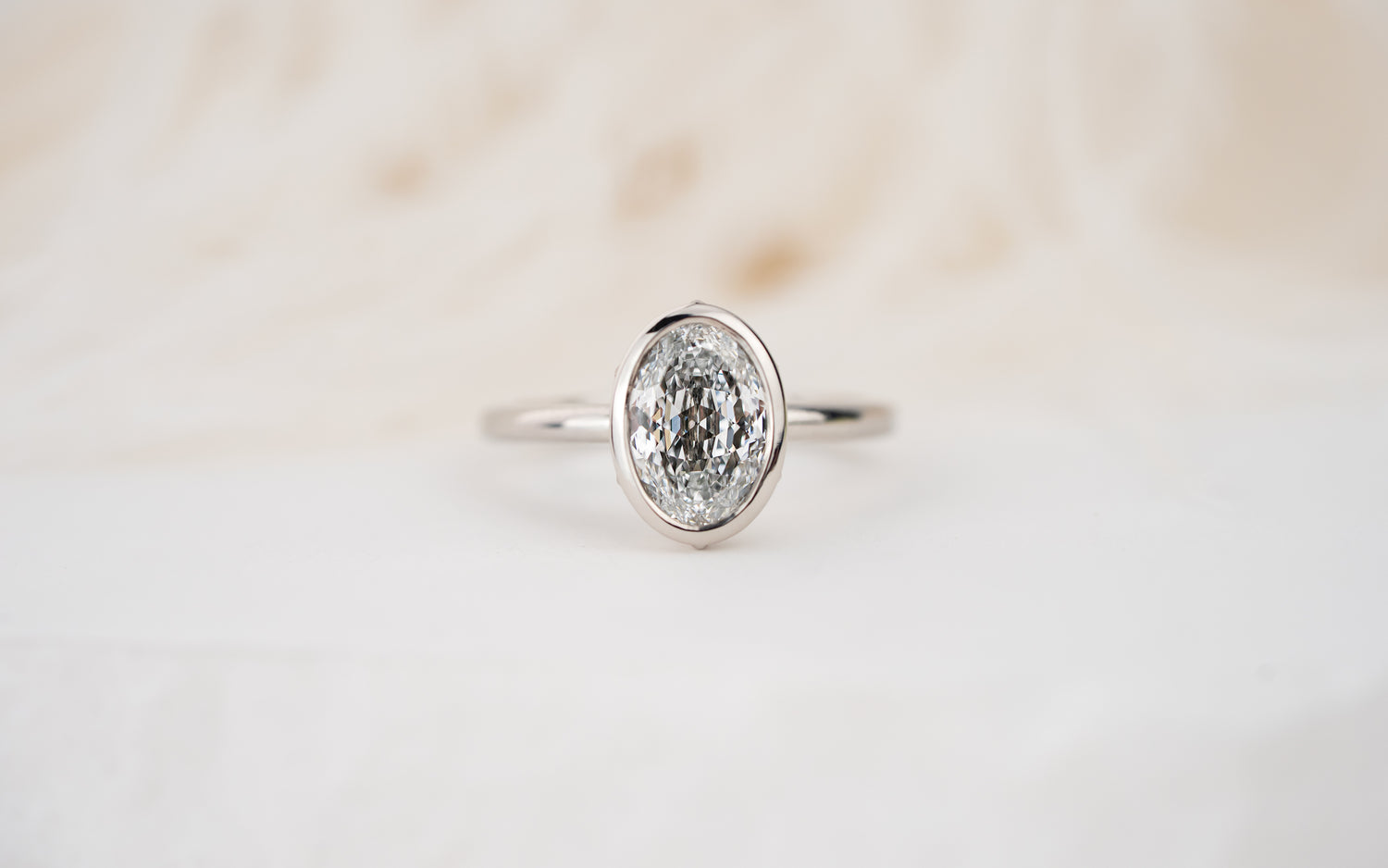 The Bezel Secret Garden Ring | 2.09 CT Portuguese Cut Oval Diamond