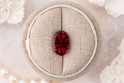6.02 CT Oval Starbrite™ Red Garnet