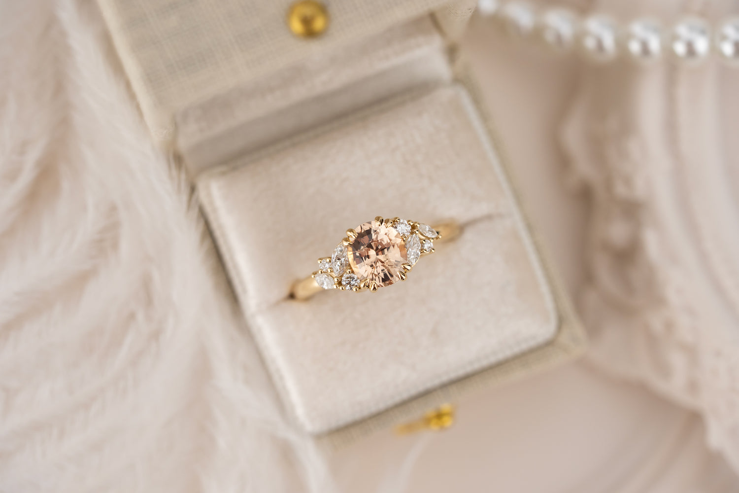 The Laurel Ring | 1.55 CT Oval Peachy Apricot Sapphire