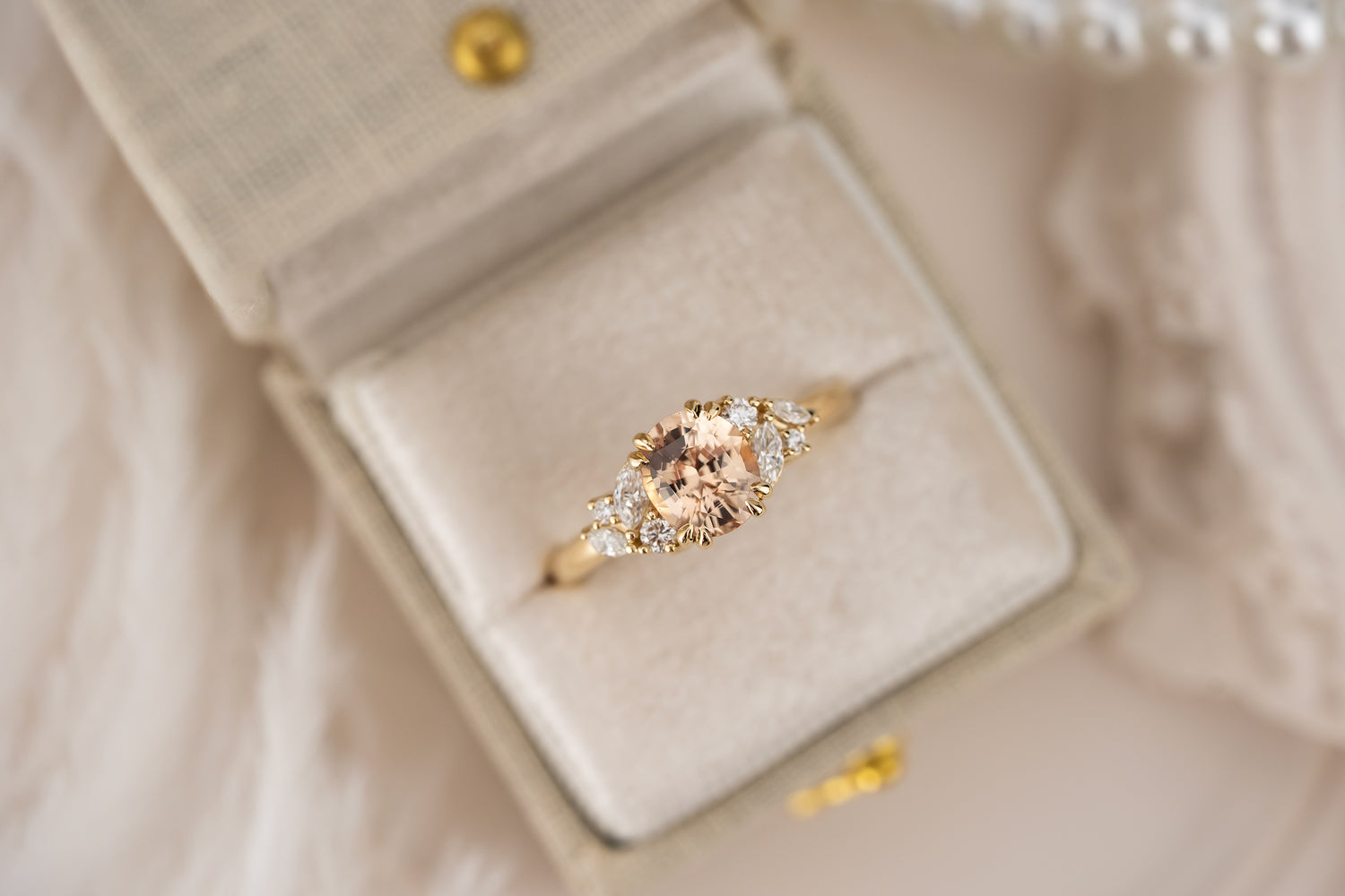 The Laurel Ring | 1.55 CT Oval Peachy Apricot Sapphire