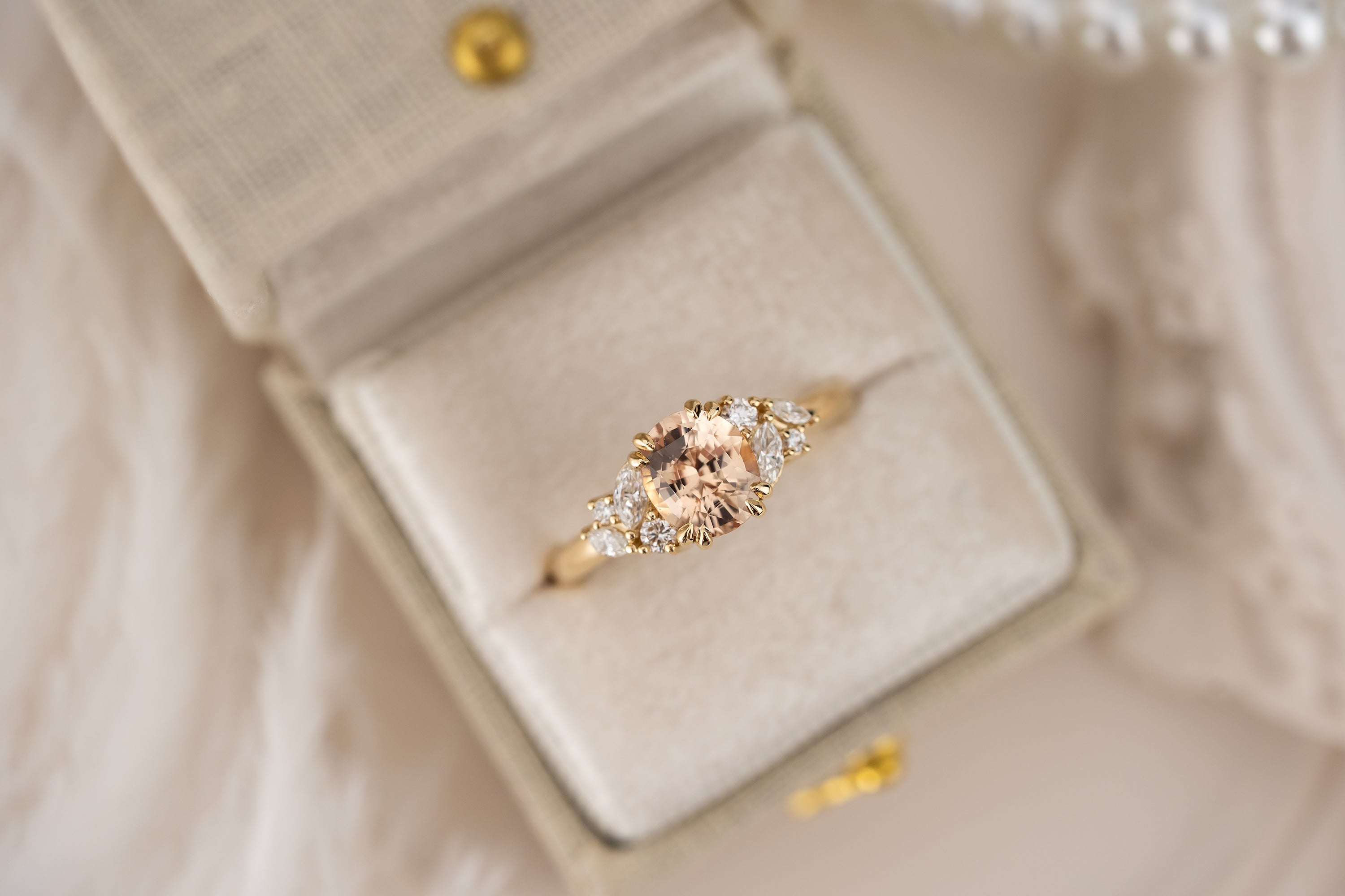 The Laurel Ring | 1.55 CT Oval Peachy Apricot Sapphire