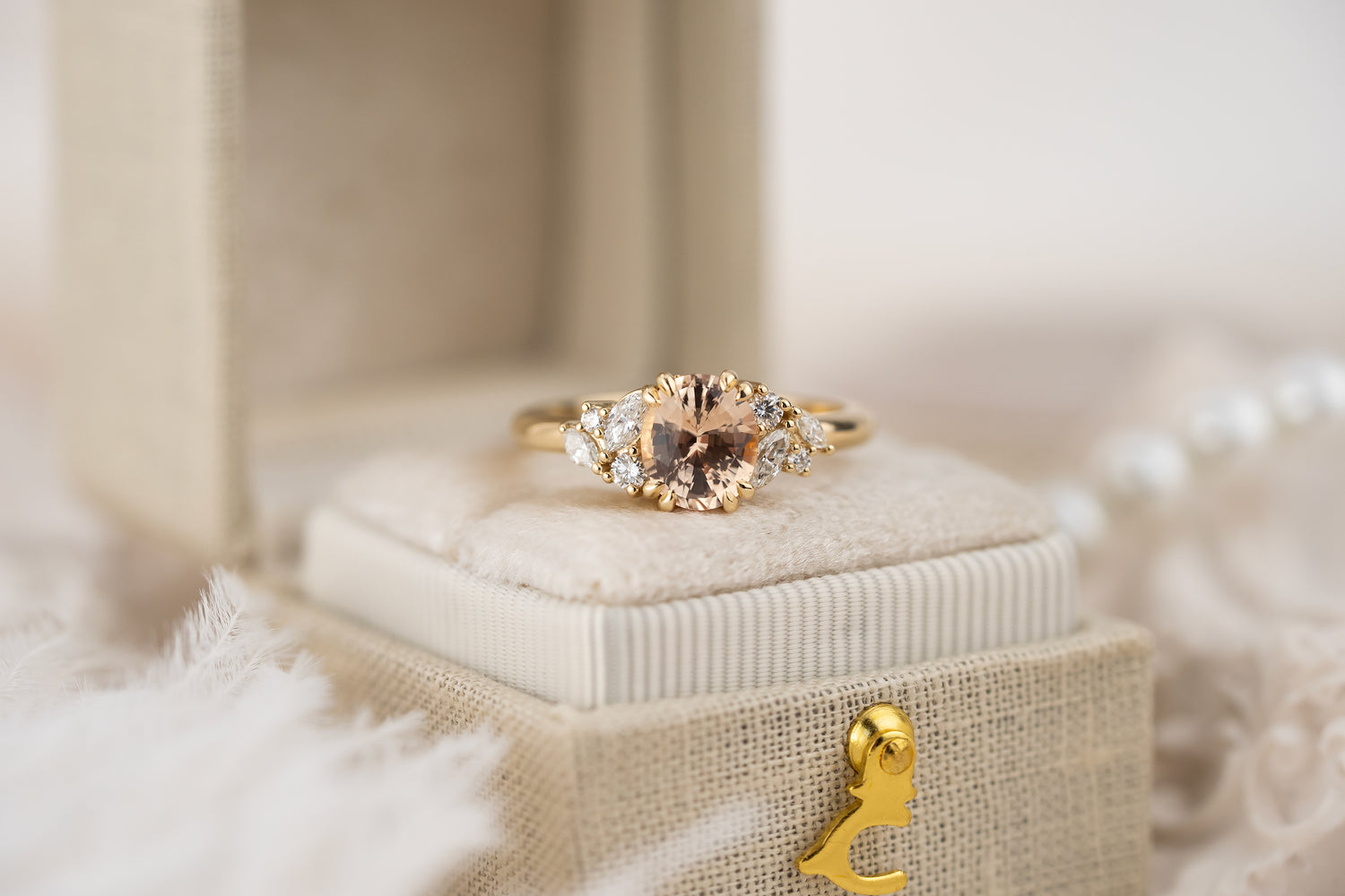 The Laurel Ring | 1.55 CT Oval Peachy Apricot Sapphire