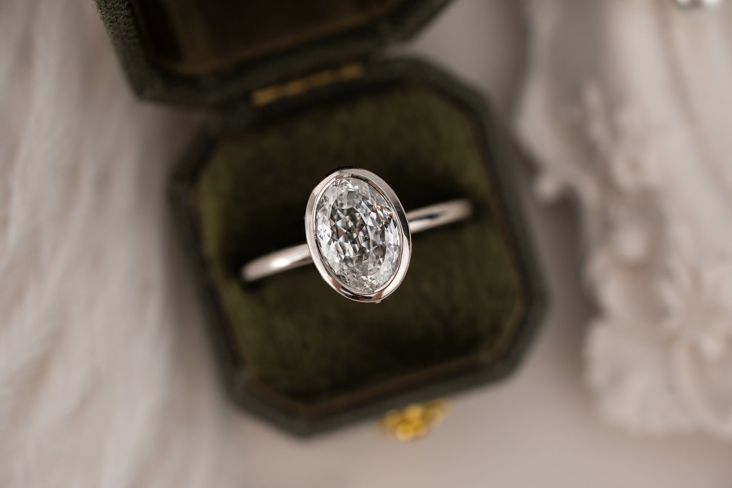 The Bezel Secret Garden Ring | 2.09 CT Portuguese Cut Oval Diamond