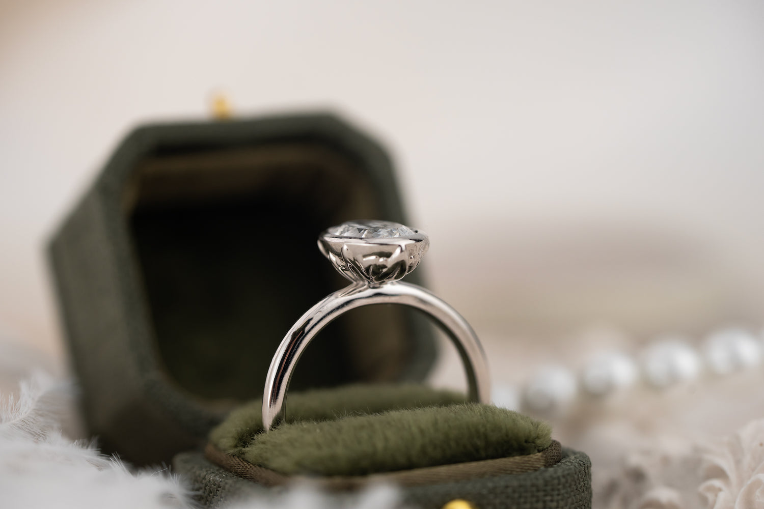 The Bezel Secret Garden Ring | 2.09 CT Portuguese Cut Oval Diamond