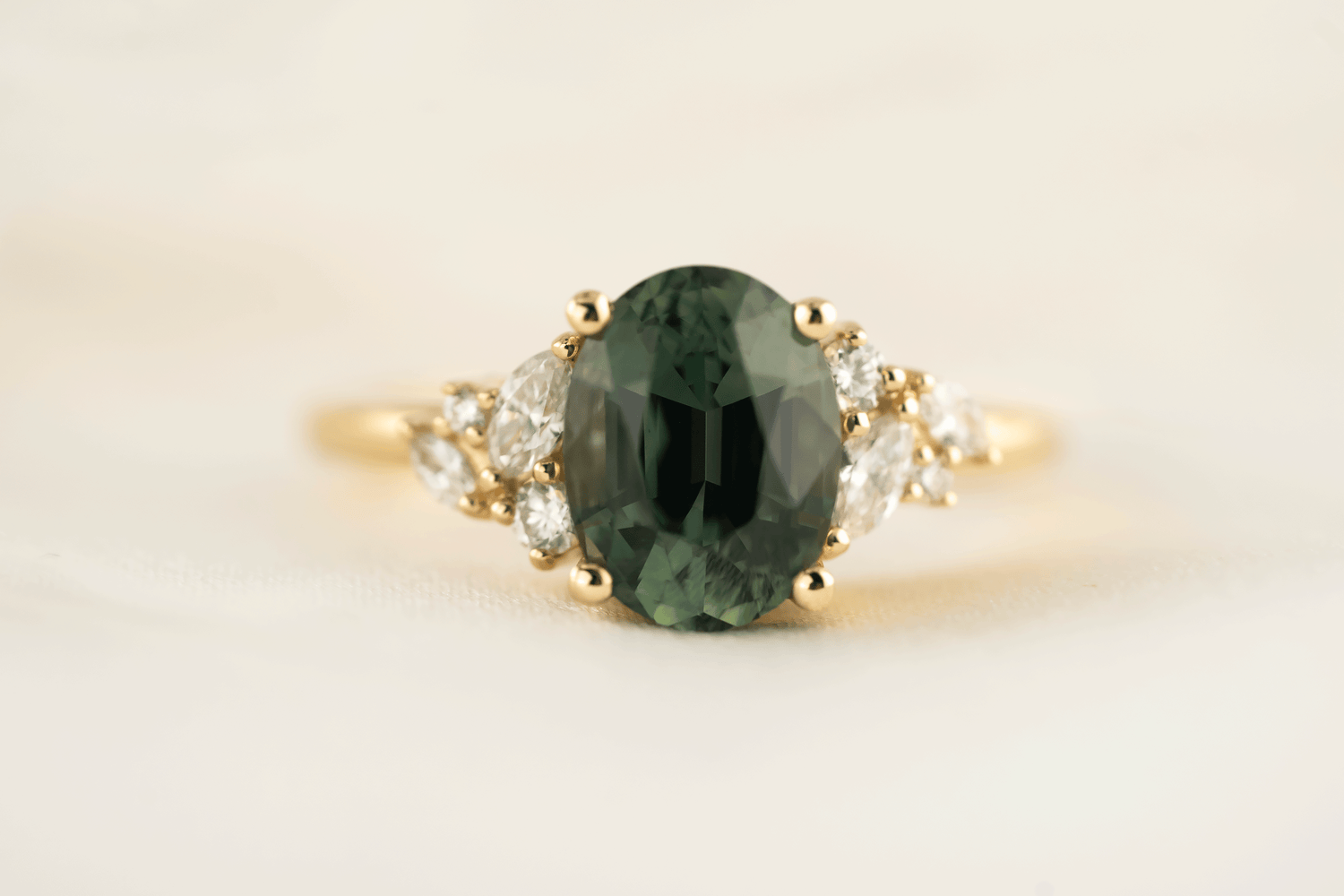 The Laurel Ring | 3.06 CT Oval Teal Green Sapphire