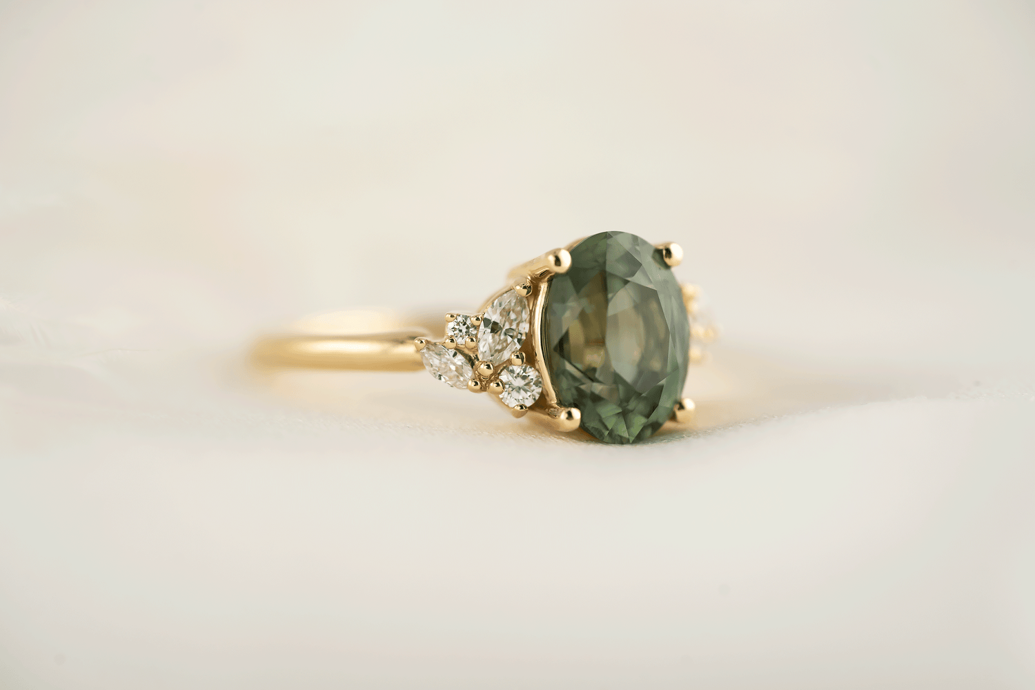 The Laurel Ring | 3.06 CT Oval Teal Green Sapphire