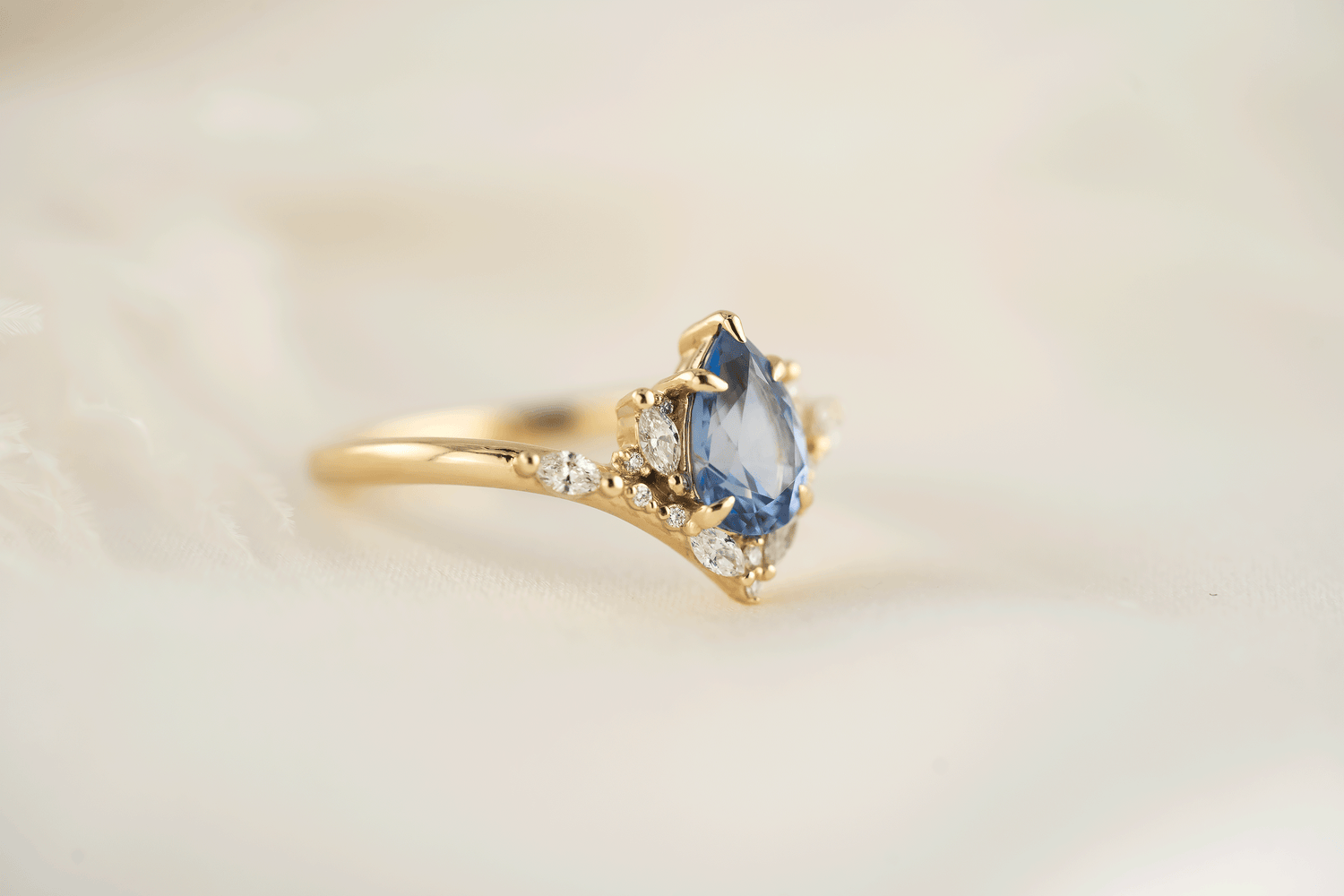 The Aurora Ring | 1.29 CT Pear Blue Sapphire