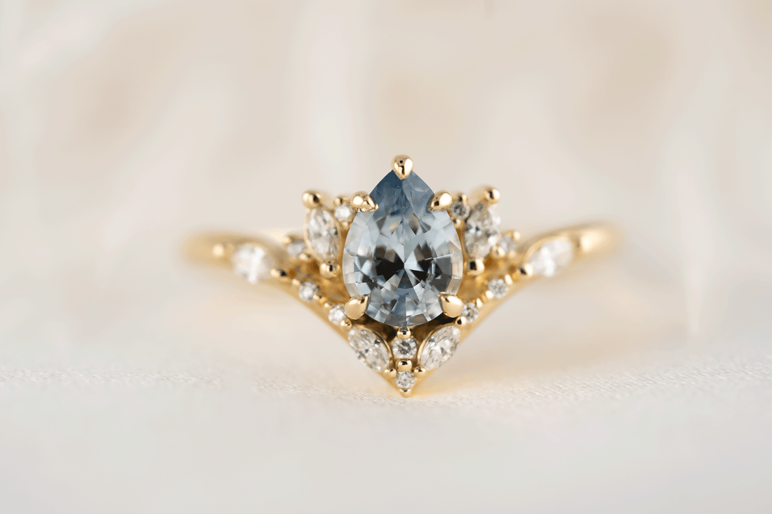 The Aurora Ring | 0.88 CT Pear Blue Sapphire