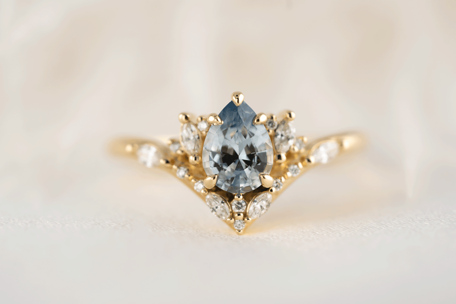 The Aurora Ring | 0.88 CT Pear Blue Sapphire