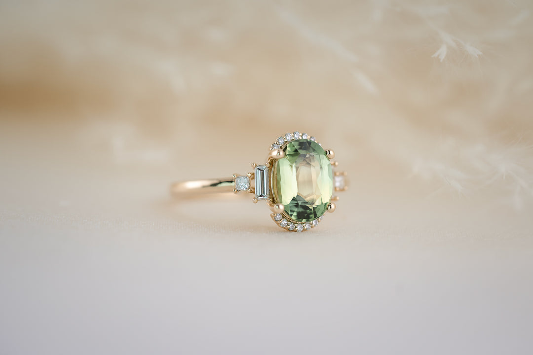 The Sura 2.42 CT Oval Apple Green Sapphire Ring