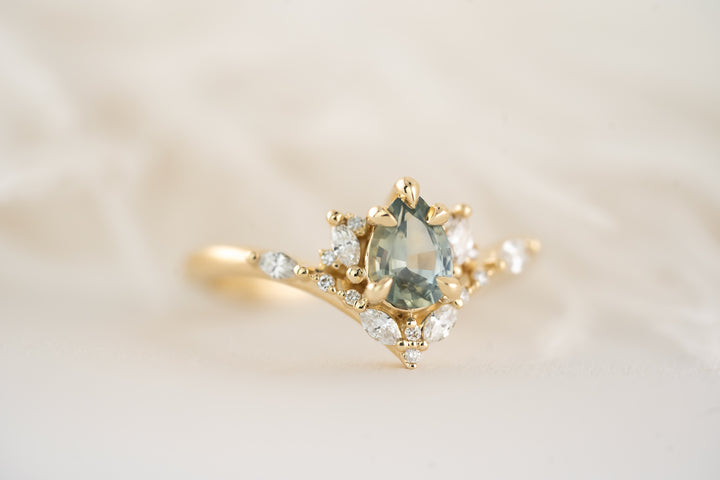 The Aurora Ring - 0.68 CT Pear Blue Montana Sapphire