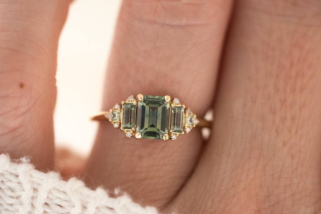 The Mira Ring With Accents - 1.1 Emerald Cut Montana Sapphire