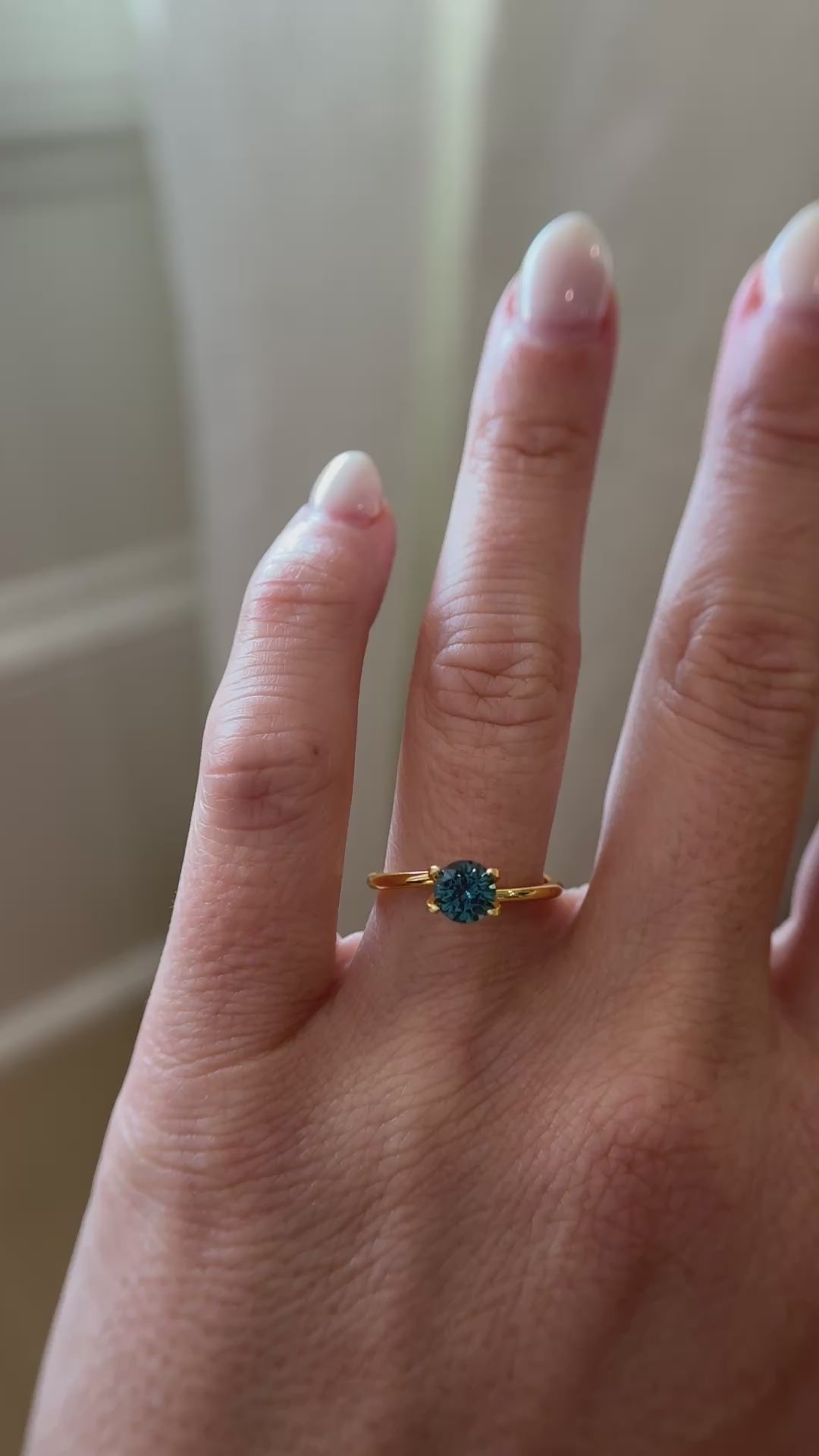 0.85 CT Round Cut Teal Montana Sapphire