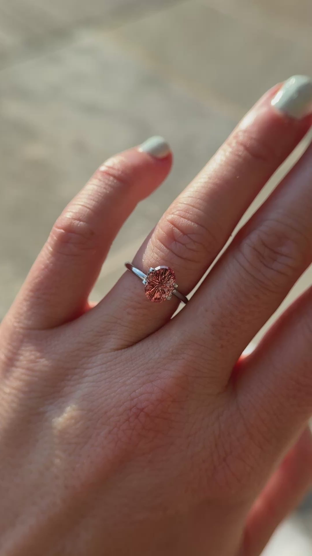 2.31 CT Oval Starbrite™ Cut Coral + Peach Sapphire
